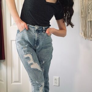 Distressed denim jeans in great shape. They are too big for me, so I am selling